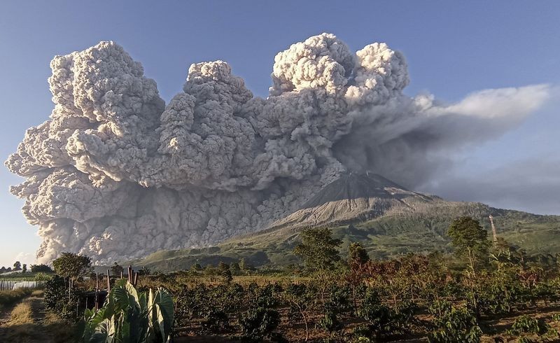 Indonesia’s Mount Sinabung volcano spreads ash into sky